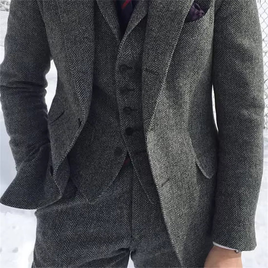 Three-piece suit in grey herringbone wool